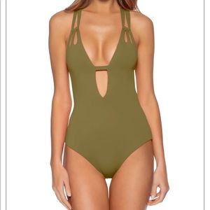 Becca Skylar one piece. M. Never worn